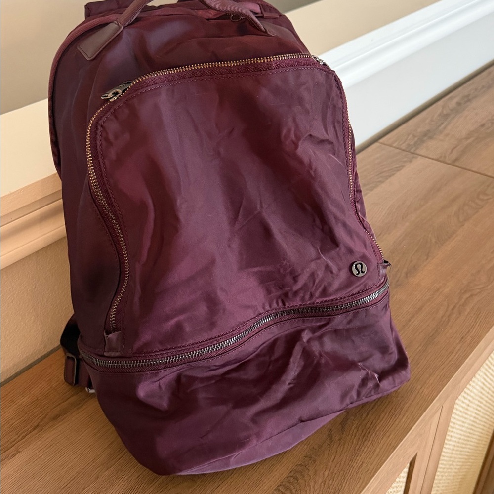 lululemon athletica maroon-colored backpack